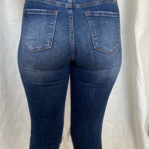 Kancan size 3/25 distressed with holes jeans